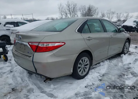 2015 Toyota Camry Hybrid Le from USA, damaged, VIN 4T1BD1FKXFU141795
